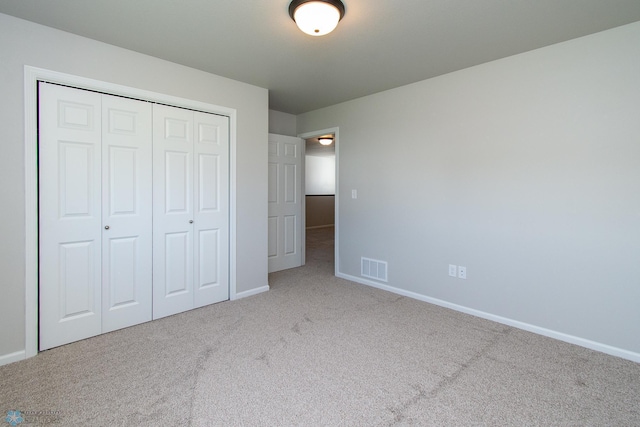 1449 68th Ave S, Fargo, ND 58104 - unfurnished bedroom with carpet and a closet
