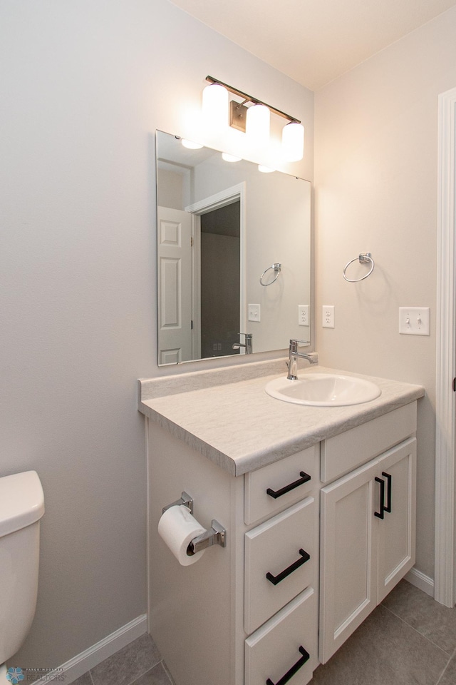 1449 68th Ave S, Fargo, ND 58104 - bathroom with tile patterned floors and vanity