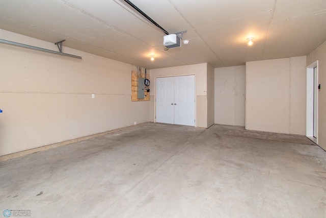 1449 68th Ave S, Fargo, ND 58104 - garage featuring electric panel and a garage door opener