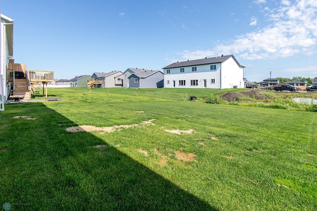 1449 68th Ave S, Fargo, ND 58104 - view of green lawn with a residential view
