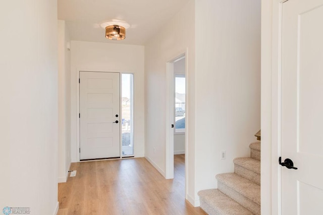 419 Reese Way, Mapleton, ND 58059 - foyer with light wood-type flooring and stairway