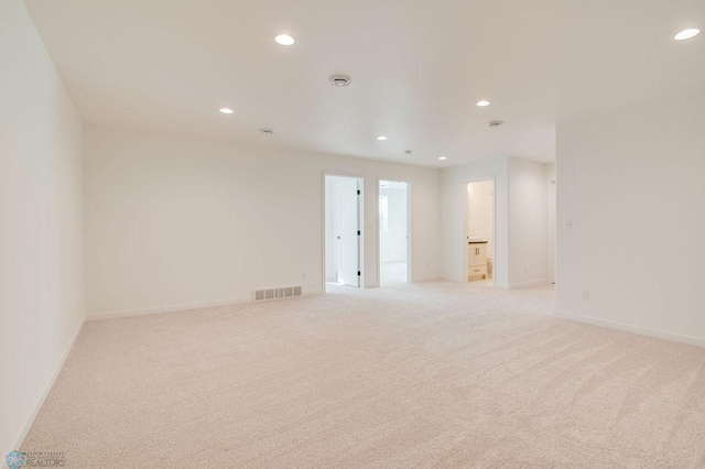 419 Reese Way, Mapleton, ND 58059 - unfurnished room with light colored carpet and recessed lighting