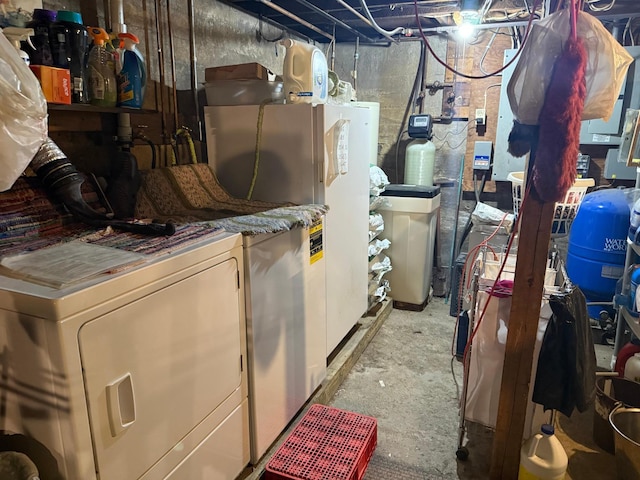 40257 Elbow Lake Store Rd, Round Lake N Twp, MN 56589 - unfinished basement featuring washer and dryer and a water pressure tank