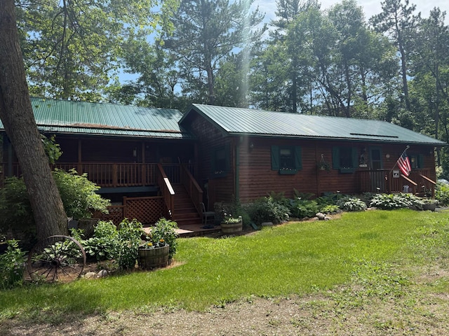 40257 Elbow Lake Store Rd, Round Lake N Twp, MN 56589 - view of front of property with a front yard, a metal roof, stairs, and a porch