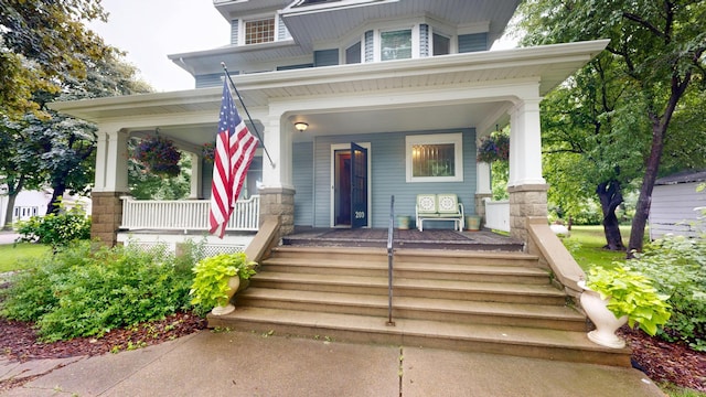 209 7th St N, Kerkhoven, MN 56252 - view of front of property with covered porch