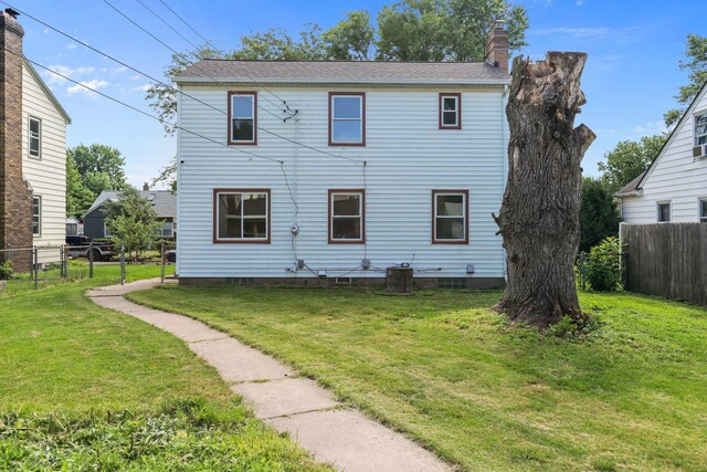 1289 Galtier St, Saint Paul, MN 55117 - back of property featuring a chimney