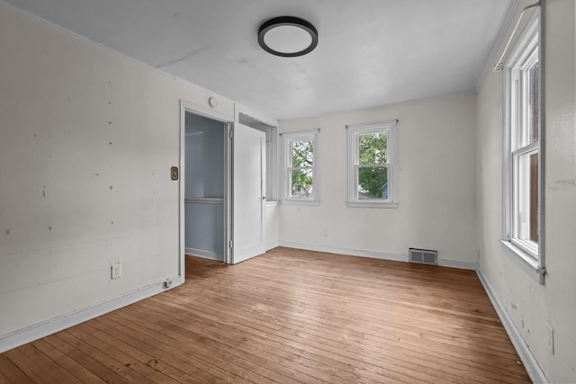 1289 Galtier St, Saint Paul, MN 55117 - empty room featuring hardwood / wood-style floors