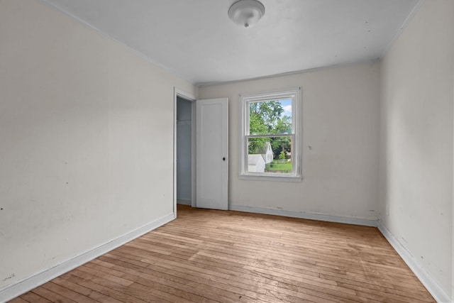 1289 Galtier St, Saint Paul, MN 55117 - unfurnished room with wood-type flooring and ornamental molding