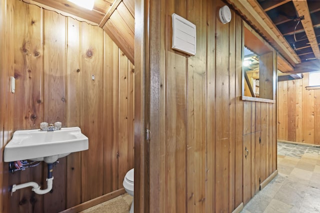 1289 Galtier St, Saint Paul, MN 55117 - half bath with wooden walls and toilet