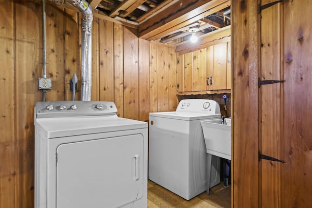 1289 Galtier St, Saint Paul, MN 55117 - laundry area featuring washer and clothes dryer and wooden walls