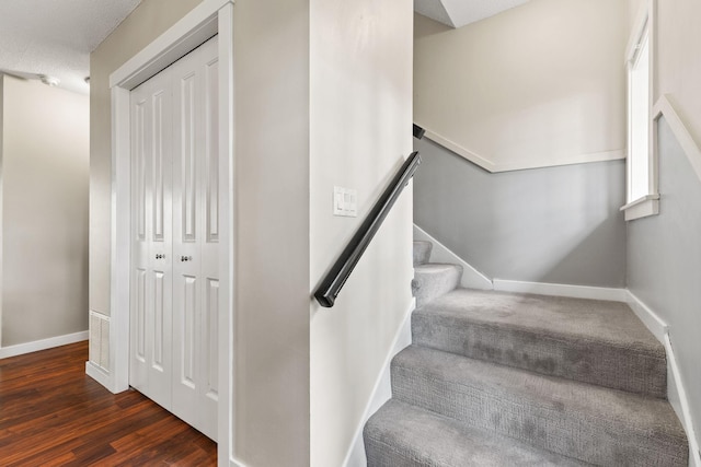 1237 Hillwind Rd NE, Fridley, MN 55432 - staircase featuring baseboards and wood finished floors