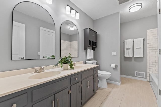 1237 Hillwind Rd NE, Fridley, MN 55432 - full bath with double vanity and shower / bath combination