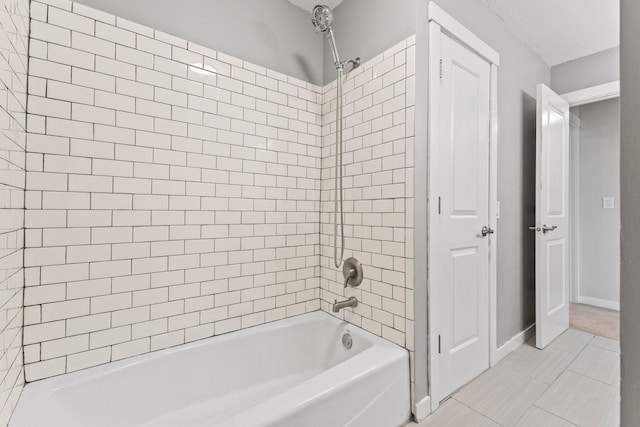 1237 Hillwind Rd NE, Fridley, MN 55432 - full bathroom featuring shower / tub combination, tile patterned flooring, and a textured ceiling