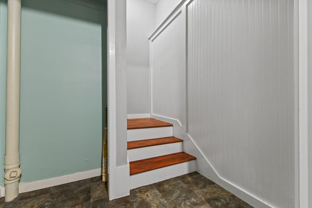 1237 Hillwind Rd NE, Fridley, MN 55432 - stairs with stone finish flooring and baseboards