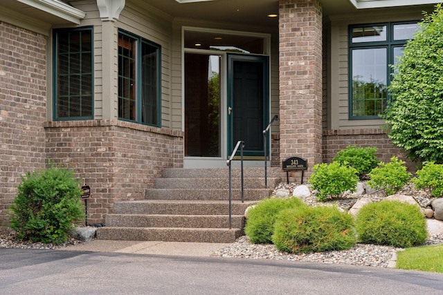 343 Waycliffe Dr N, Wayzata, MN 55391 - doorway to property featuring brick siding