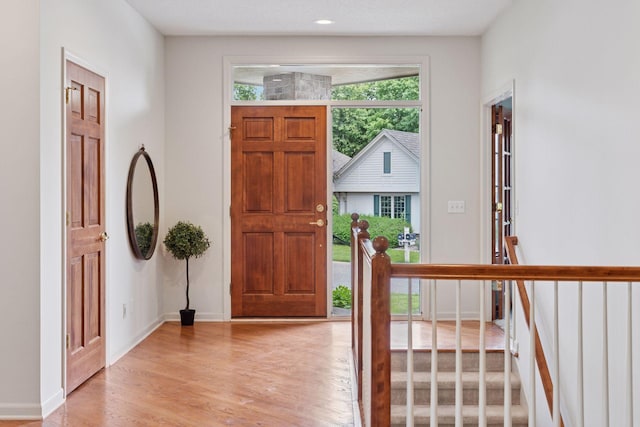 343 Waycliffe Dr N, Wayzata, MN 55391 - entryway with light wood finished floors and baseboards