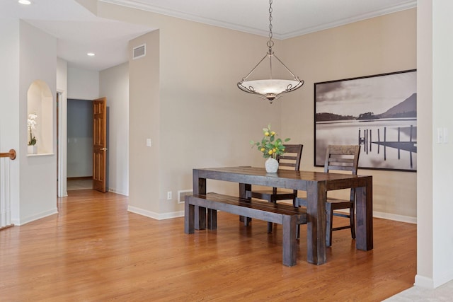 343 Waycliffe Dr N, Wayzata, MN 55391 - dining room featuring light wood-style floors, recessed lighting, and crown molding