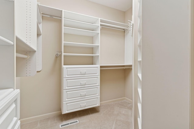343 Waycliffe Dr N, Wayzata, MN 55391 - walk in closet featuring carpet