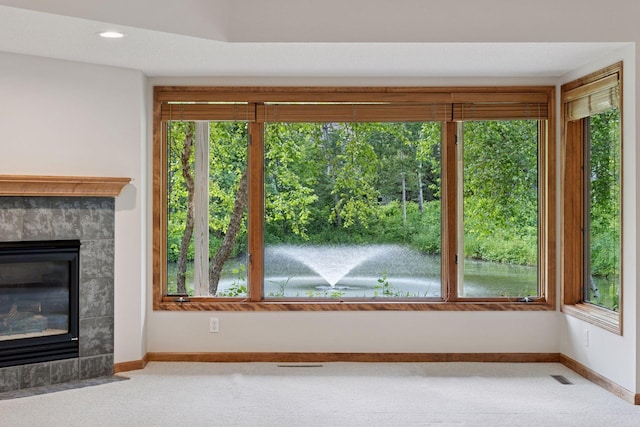 343 Waycliffe Dr N, Wayzata, MN 55391 - unfurnished living room featuring carpet and a tile fireplace