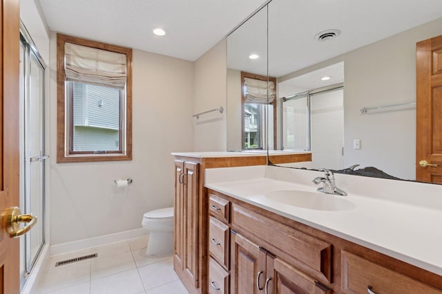 343 Waycliffe Dr N, Wayzata, MN 55391 - bathroom with a shower stall, tile patterned floors, vanity, and recessed lighting