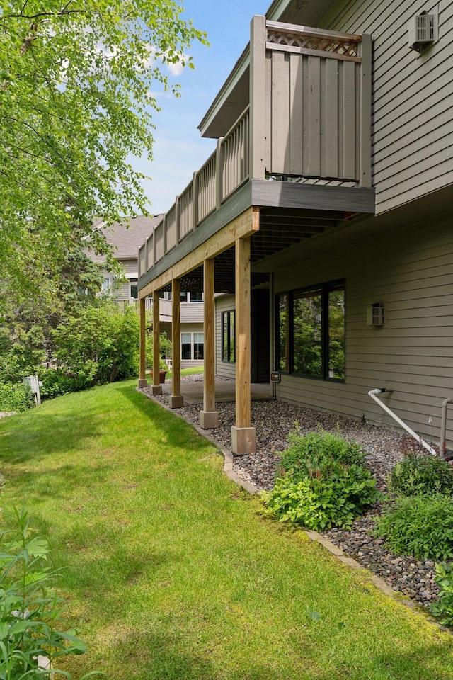 343 Waycliffe Dr N, Wayzata, MN 55391 - back of house with a lawn, a deck, a wall unit AC, and a patio