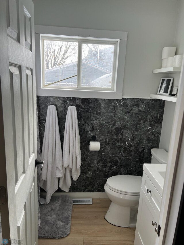 1822 7th Ave S, Fargo, ND 58103 - bathroom featuring vanity and wood finished floors