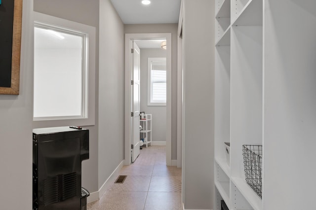 15560 110th Ave N, Dayton, MN 55369 - hall featuring baseboards and light tile patterned flooring