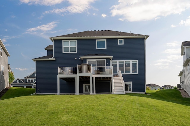 15560 110th Ave N, Dayton, MN 55369 - rear view of house featuring a wooden deck, stairway, and a yard