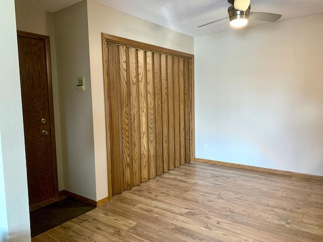 2419 25 1/2 Ave S Unit 205, Fargo, ND 58103 - empty room with light wood-type flooring and a ceiling fan