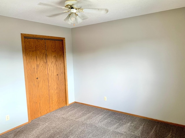 2419 25 1/2 Ave S Unit 205, Fargo, ND 58103 - unfurnished bedroom featuring carpet, a closet, and a ceiling fan