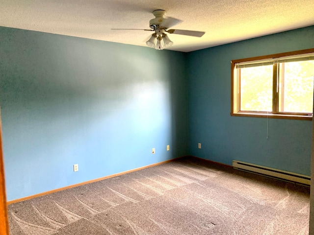 2419 25 1/2 Ave S Unit 205, Fargo, ND 58103 - empty room with a baseboard radiator, carpet, ceiling fan, and a textured ceiling