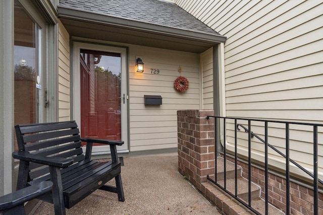 729 Summit Ave, Saint Paul, MN 55105 - property entrance with roof with shingles and a porch