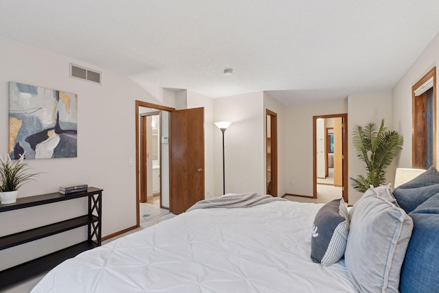 729 Summit Ave, Saint Paul, MN 55105 - bedroom featuring baseboards and ensuite bathroom