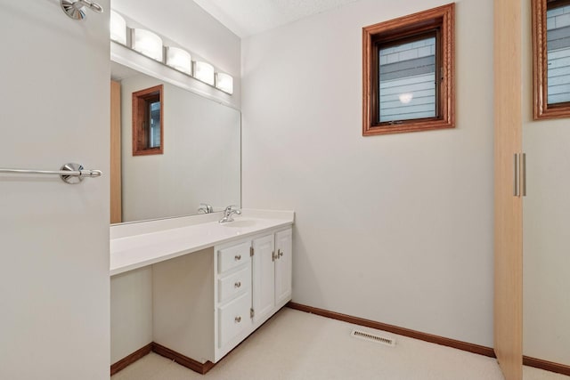 729 Summit Ave, Saint Paul, MN 55105 - bathroom featuring vanity and baseboards