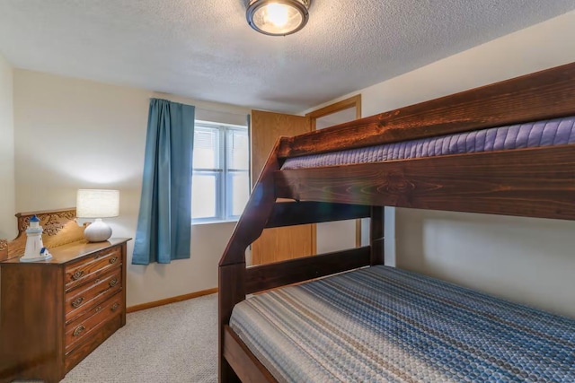 5960 165th St NE, Atwater, MN 56209 - carpeted bedroom with a textured ceiling and baseboards