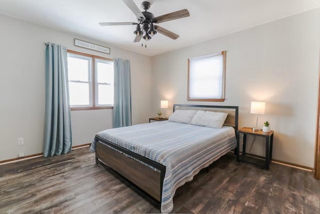 5960 165th St NE, Atwater, MN 56209 - bedroom with dark wood-style floors and ceiling fan