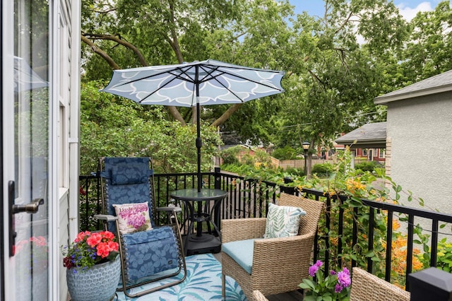 977 Portland Ave Unit 1, Saint Paul, MN 55104 - deck featuring view of scattered trees
