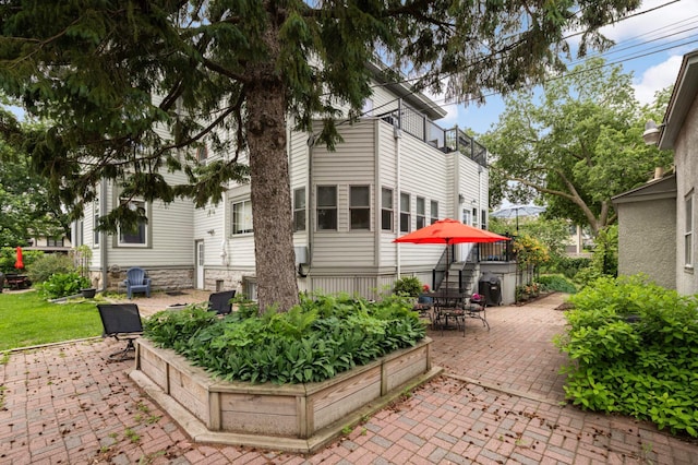 977 Portland Ave Unit 1, Saint Paul, MN 55104 - patio / terrace featuring a patio area and outdoor dining area
