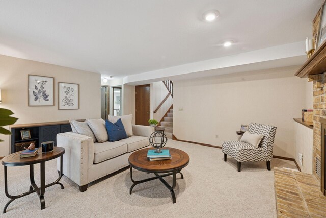 7516 Colorado Ave N, Brooklyn Park, MN 55443 - living area with a brick fireplace, stairway, and light carpet