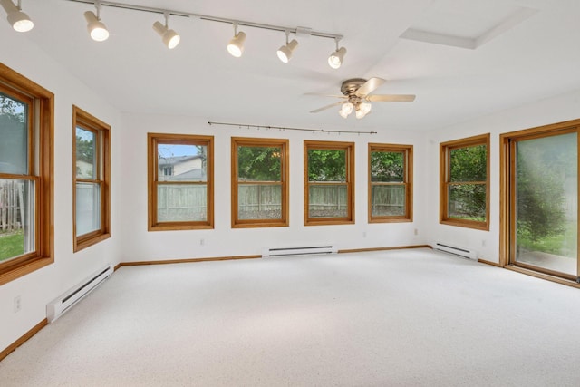 7516 Colorado Ave N, Brooklyn Park, MN 55443 - unfurnished sunroom with a baseboard radiator and track lighting