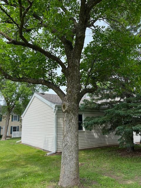 4918 Grenwich Trl N, Oakdale, MN 55128 - view of property exterior with a yard