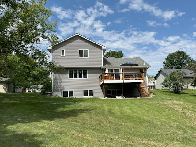 402 14th St, Delano, MN 55328 - back of house with a deck, stairway, and a yard