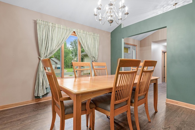 22027 Ethan Ave, Forest Lake, MN 55025 - dining room featuring a chandelier, wood finished floors, and vaulted ceiling