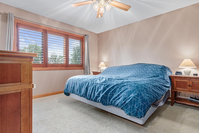 22027 Ethan Ave, Forest Lake, MN 55025 - carpeted bedroom with baseboards and a ceiling fan