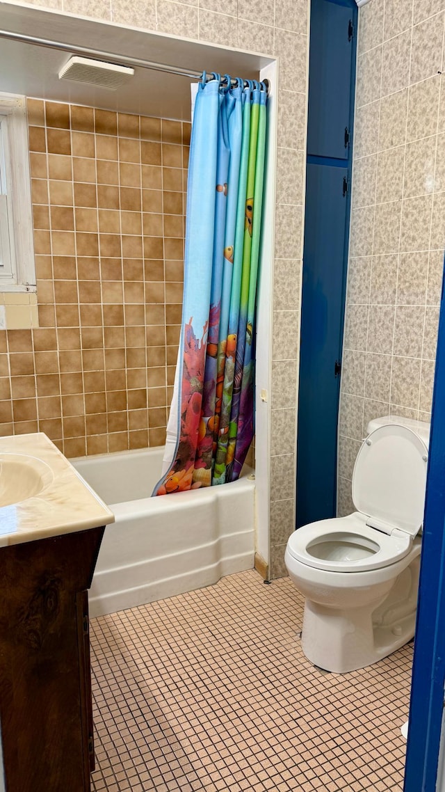 112 4th St E, Park Rapids, MN 56470 - bathroom with shower / tub combo, vanity, and tile patterned floors