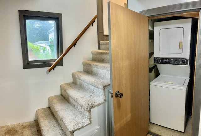 410 10th St SW, Willmar, MN 56201 - washroom featuring stacked washer / drying machine