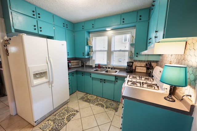 938 38th Ave N, Saint Cloud, MN 56303 - kitchen with white appliances, backsplash, a textured ceiling, light tile patterned floors, and under cabinet range hood