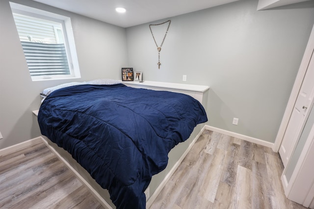 938 38th Ave N, Saint Cloud, MN 56303 - bedroom with wood finished floors and recessed lighting