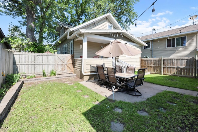 938 38th Ave N, Saint Cloud, MN 56303 - fenced backyard with a patio and a gate