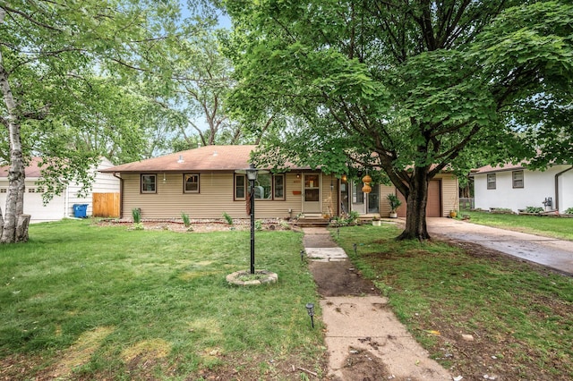 6121 Trinity Dr NE, Fridley, MN 55432 - single story home featuring concrete driveway, a garage, and roof with shingles